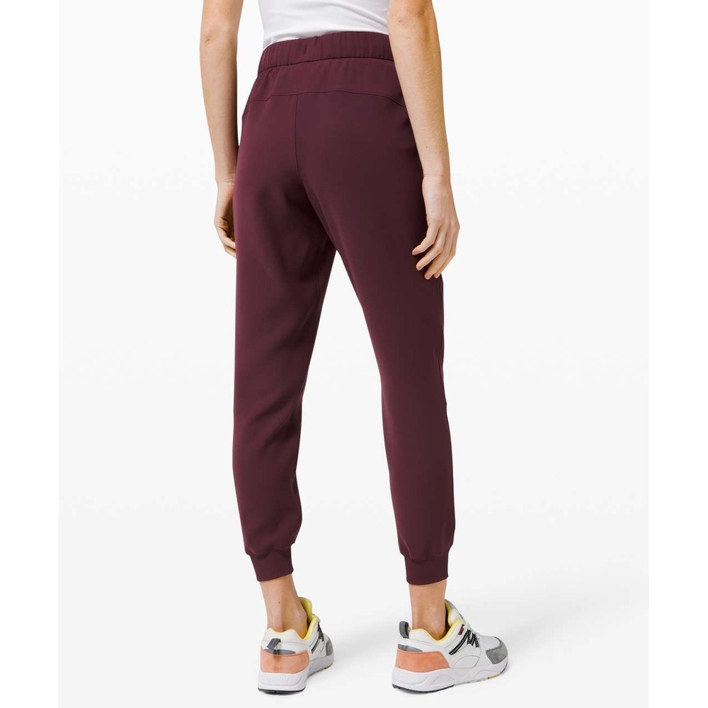 Lululemon On the Fly Jogger Woven pants Size 12 burgundy red Cassis